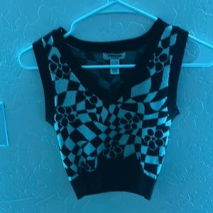 Black and white checkered crop with flowers on it